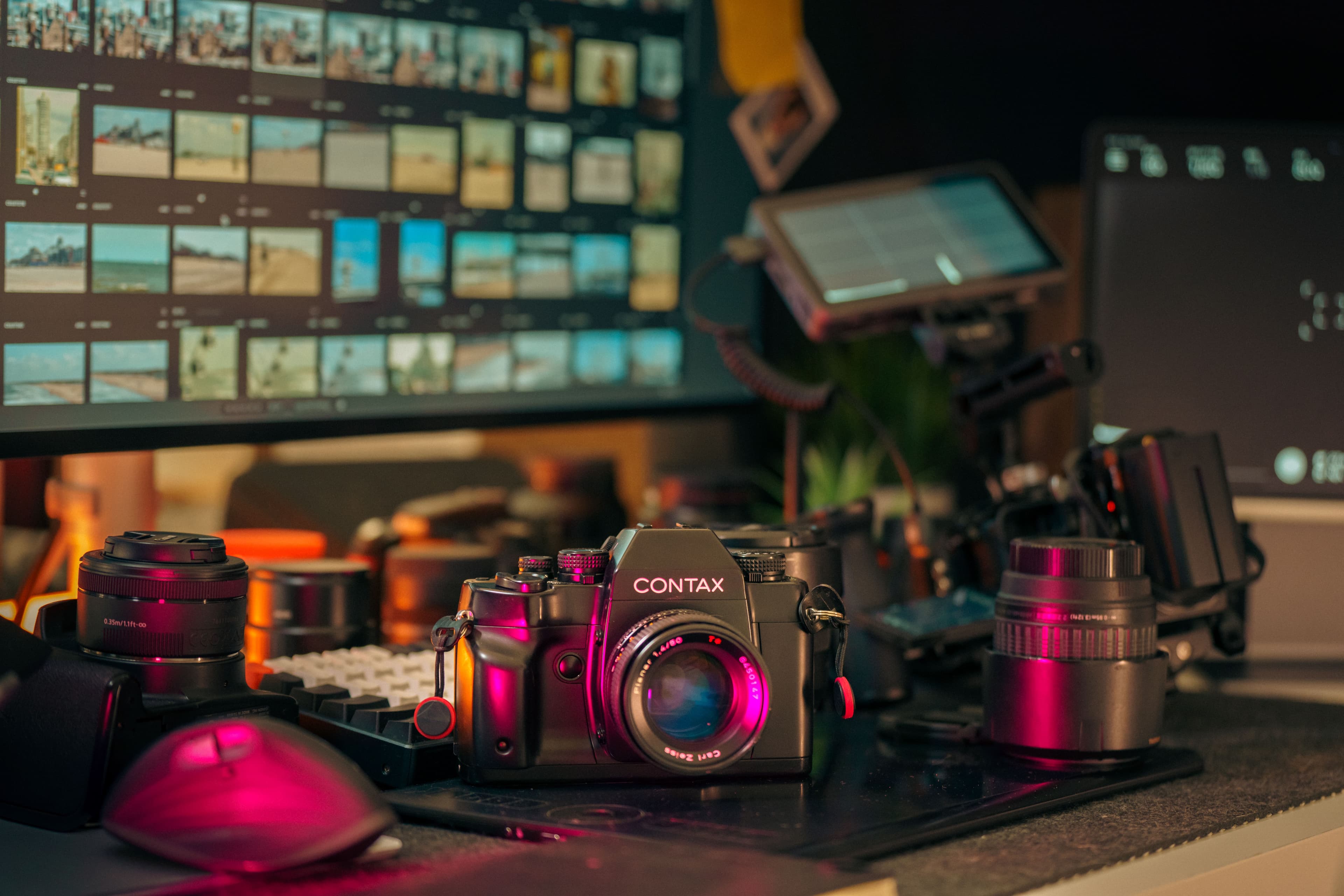 Camera and editing desk in a modern creative studio.