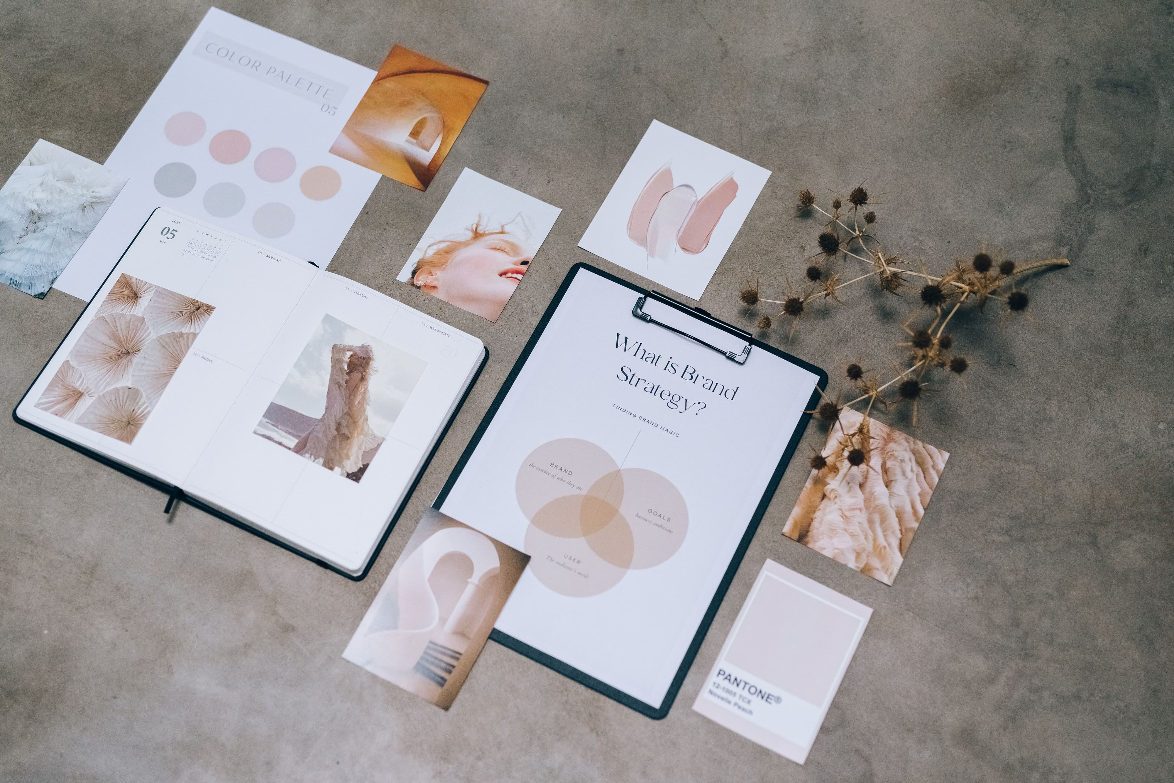 Creator workspace with visual planning materials for brand strategy.